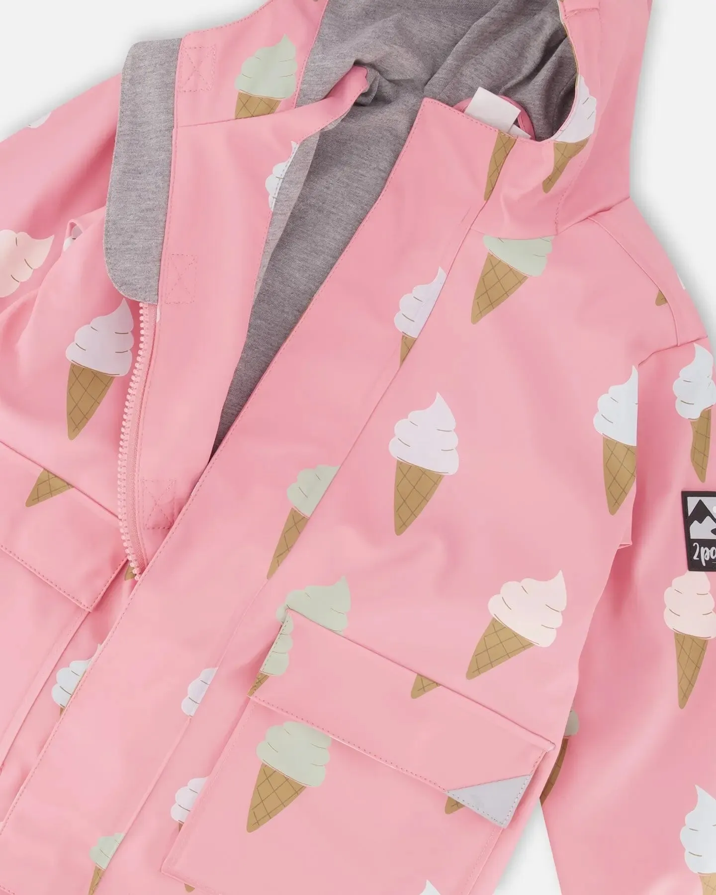 Pink Raincoat With Cones That Change Color Upon Contact With Water